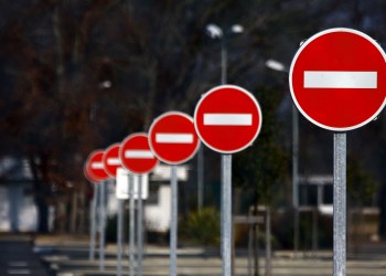 Major Bitcoin Exchanges Crippled by DDOS Attacks Amid Record Price Rally