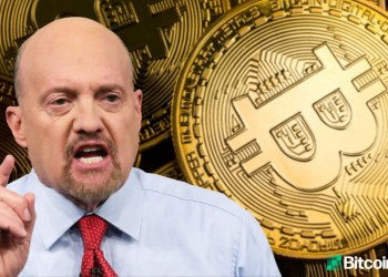 Picture of Jim Cramer with bitcoins behind him