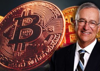 Ricardo Salinas smiling with bitcoins behind him