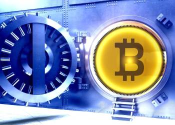 Picture of a bitcoin next to a bank vault