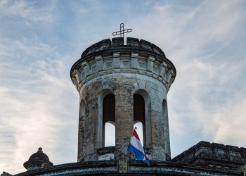 Paraguay, a castle top and the flag