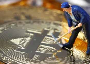 bitcoin Picture of a figurine with a pick axe mining bitcoin