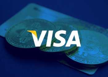 Picture of three bitcoin crypto coins on top of a credit card, with Visa written in front of it