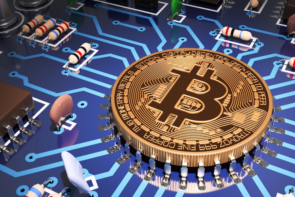 Picture of a bitcoin on a circuit board