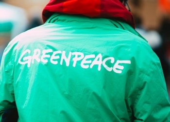 Ripple, Greenpeace logo in jacket
